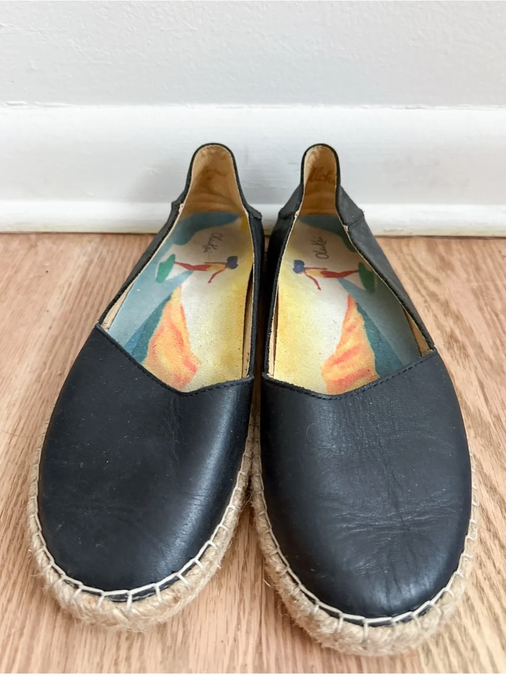 OluKai Kaula Pa'A 'Ili black leather slip-on espadrille flats